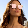 Model in cat eye sunglasses
